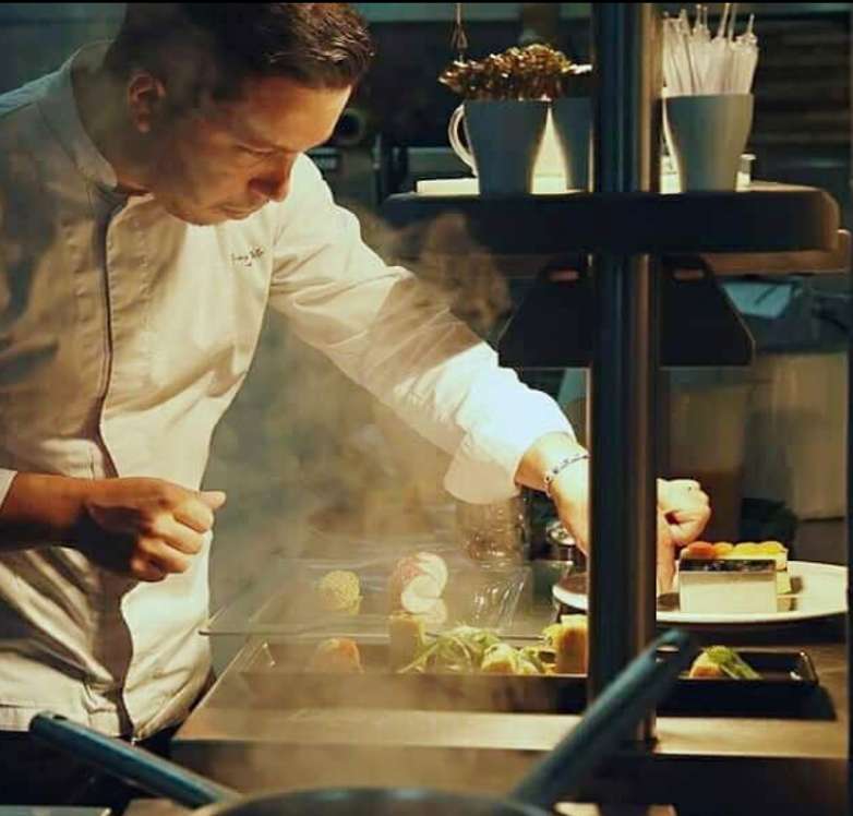 Chef Iosif Giannitsopoulos preparing a dish