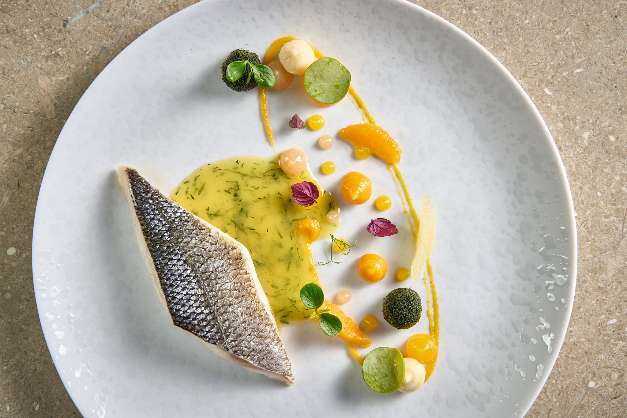 Seabass with greens and citrus